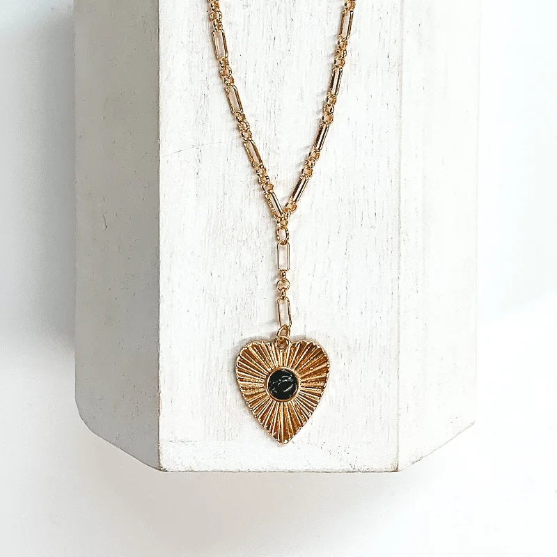 Worth Staying Gold Necklace with Sunburst Heart Pendant and Small Stone in Black