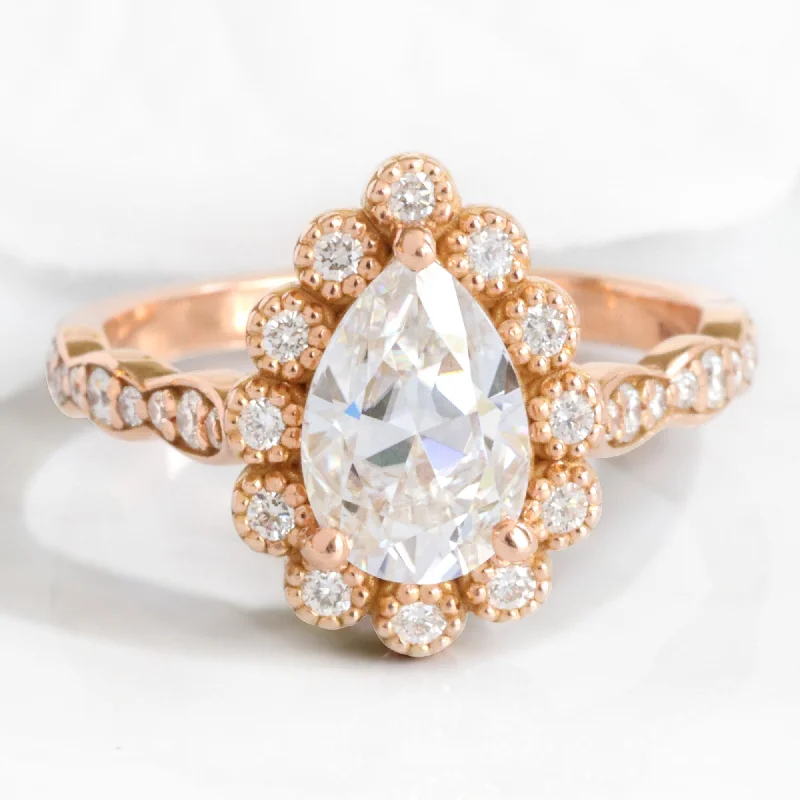 Pear Moissanite Engagement Ring in Vintage Luna Halo Diamond Ring